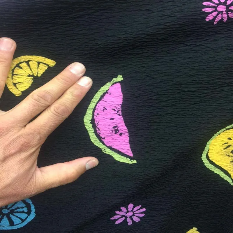 60 Inches Wide Poly Rayon Textured With Fruits Print On Black Background Rayon Challis